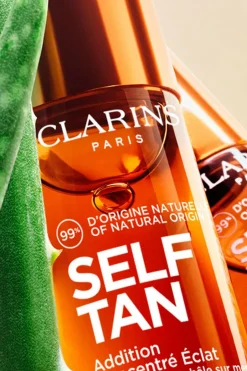 Discount Clarins Auto-bronzant visage Addition Concentré Eclat